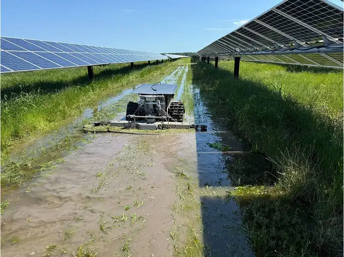 Robotic Lawn Mowing in Water in Solar Field